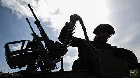 Russian troops defending a site in Sadky, northeast Ukraine